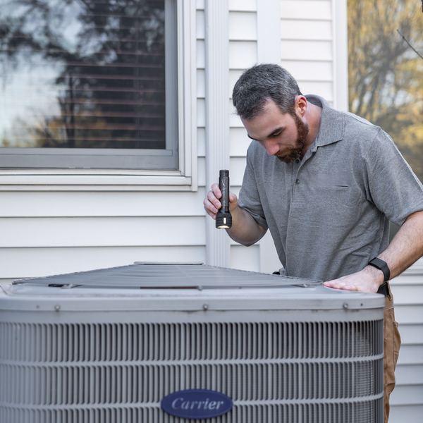 Air conditioning service on outdoor condenser unit in Joondalup